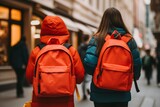 First day elementary school group little kids schoolchildren pupils students together going college class lesson study learn red backpacks back view. New academic semester year start primary education