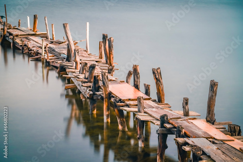 old wooden pier in the lake © Aytug Bayer