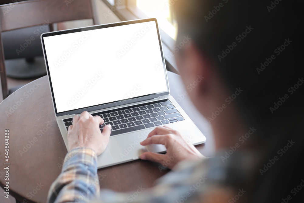 computer screen blank mockup.hand woman work using laptop with white background for advertising,contact business search information on desk at coffee shop.marketing and creative design computer screen blank mockup.hand woman work using laptop with white background for advertising,contact business search information on desk at coffee shop.marketing and creative design