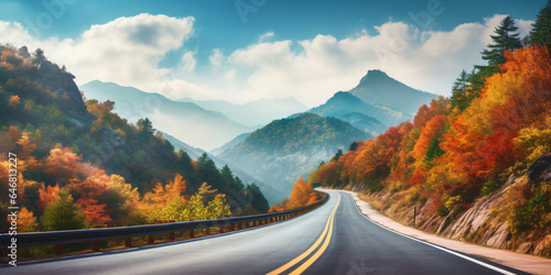 road leading to autumn mountain scenery © overrust