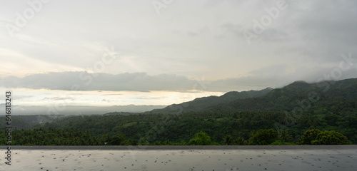 a mix of sunset and rainy weather of Mount Batulao photo