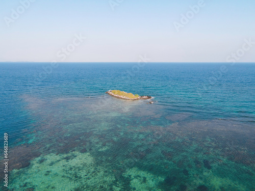 Fototapeta Naklejka Na Ścianę i Meble -  Aerial view of remote island in Karimunjawa Islands, Jepara, Indonesia. Coral reefs, white sand beaches. Top tourist destination, best diving snorkelling.