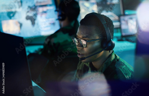 Canvas Print Military control room, computer and man with headset, support or tech for communication