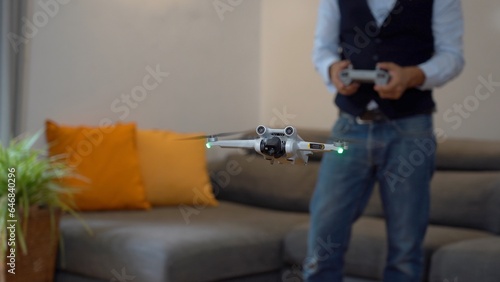 Italy , Milan - Real estate photographer use professional drone and camera to take pictures and video of the house - interior home shooting - home staging to sell the property apartment 
