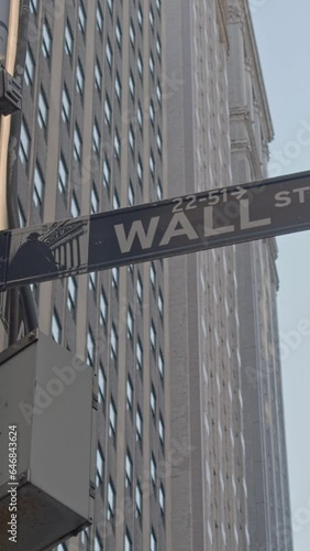 Wall street signpost, Financial District, Lower Manhattan, New York City, close up, vertical short video