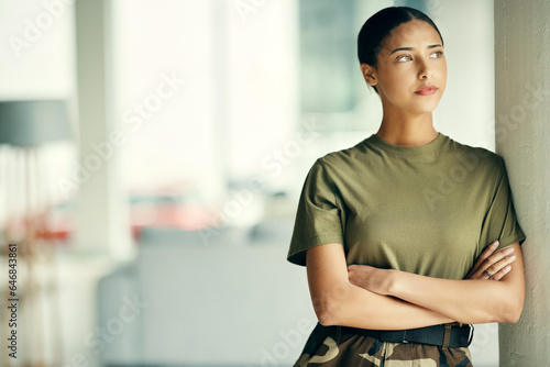 Army, idea and arms crossed with a woman soldier in uniform for safety, service or patriotism Military, thinking and a serious young war hero looking confident or ready for battle in camouflage