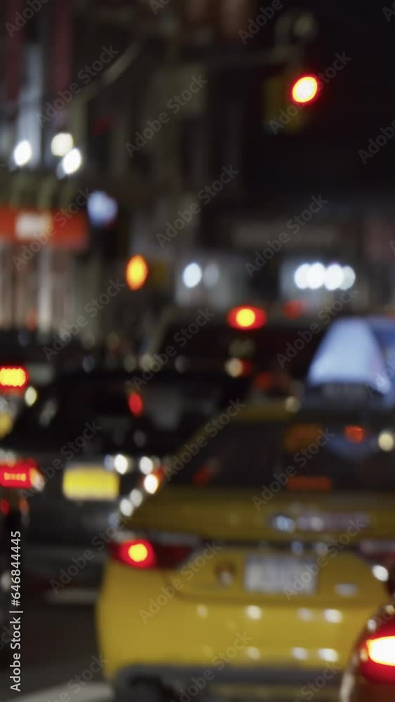 Traffic in New York City, jammed street, night-time, vertical short video Traffic in New York City, jammed street, night-time, vertical short video