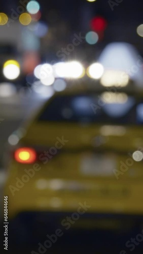 Street in New York City, night-time, blurred, vertical shorts