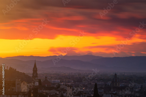 The city of Florence and the Apennines seen from above at the sunset photo