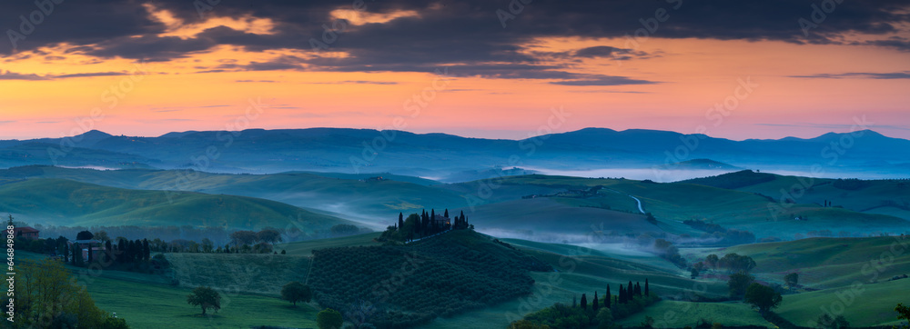 Wide banner panorama of the famous Podere Belvedere in Tuscany at sunrise - obrazy, fototapety, plakaty 