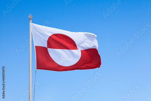 Greenland flag waving in mid air photo