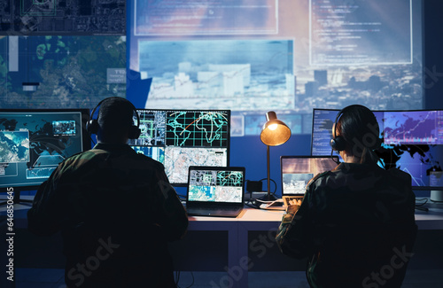 Bilde på lerret Military control room, computer screen and team with surveillance, headset and tech communication from back