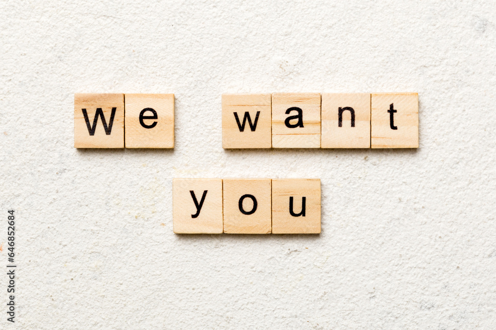 We Want You word written on wood block. We Want You text on cement table for your desing, concept We Want You word written on wood block. We Want You text on cement table for your desing, concept