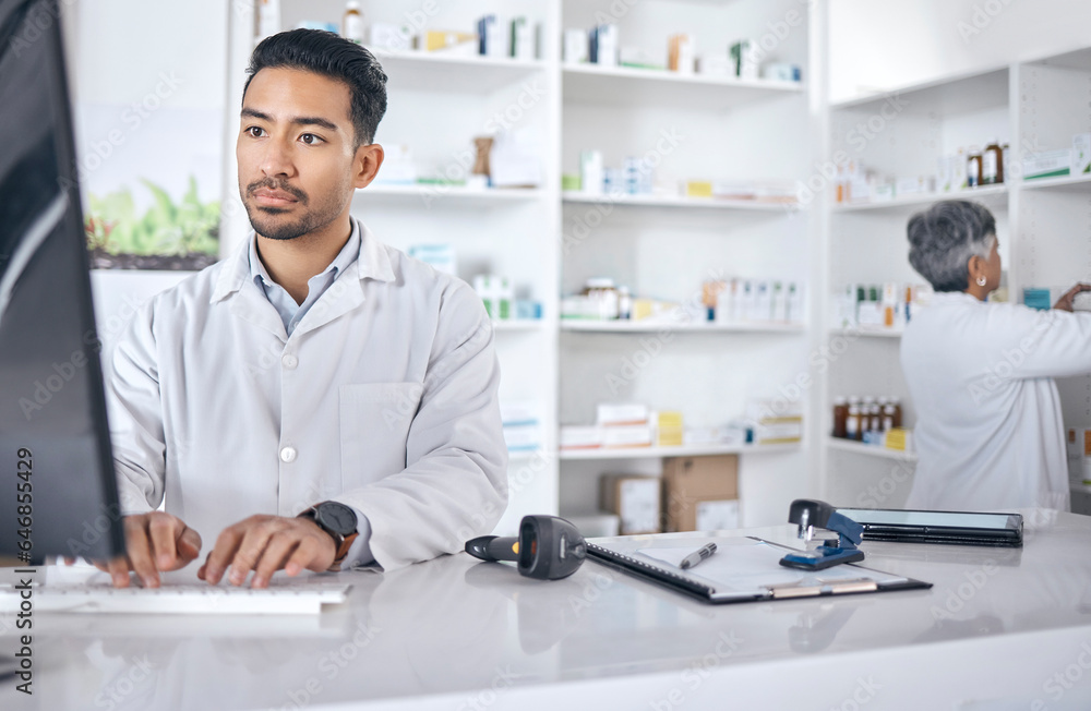 Pharmacist, computer and man typing, inventory and connection with network, website information and wellness. Person, staff and employee with a pc, online reading and search internet with telehealth