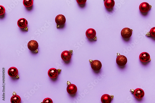 Christmas composition. a pattern of christmas balls on colored background. Flat lay, top view New year decor