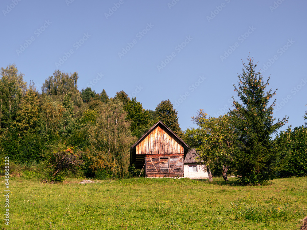 Old authentic wood house hayloft Carpathian mountains Ukraine Europe. Local countryside travel hiking trails Cottagecore Old authentic wood house hayloft Carpathian mountains Ukraine Europe. Local countryside travel hiking trails Cottagecore