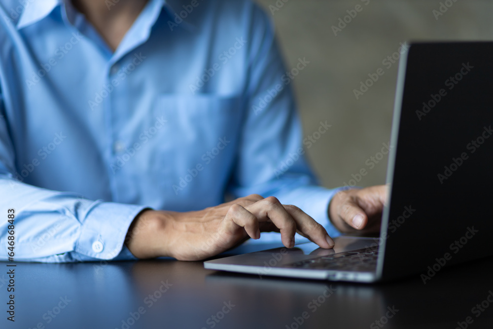 Male hand typing on laptop computer keyboard searching. Male hand typing on laptop computer keyboard searching.