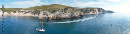 Most Beautiful High Angle Footage of British Landscape and Sea View of Durdle Door Beach of England Great Britain, UK. Footage Was captured in the Morning with Drone's camera on September 9th, 2023