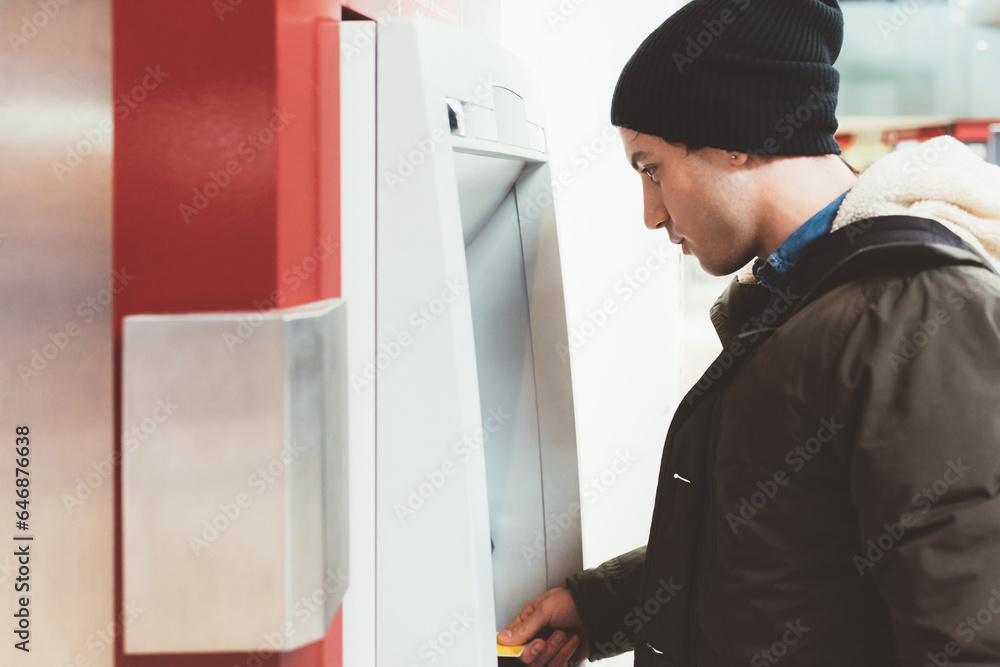 young man beautiful using atm machine young man beautiful using atm machine