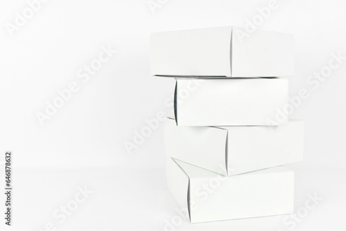 Set of white boxes packaging on white background.
