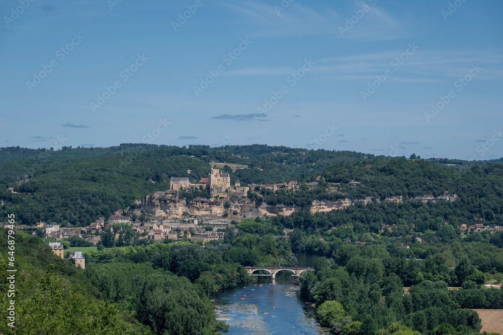 Aerial view of the River Dordogne, Ch?teau de Beynac (a fortified clifftop castle) and the Beynac-et-Cazenac village classified as one of the most beautiful villages of France in summer