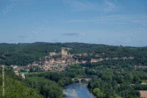 Aerial view of the River Dordogne, Ch?teau de Beynac (a fortified clifftop castle) and the Beynac-et-Cazenac village classified as one of the most beautiful villages of France in summer photo