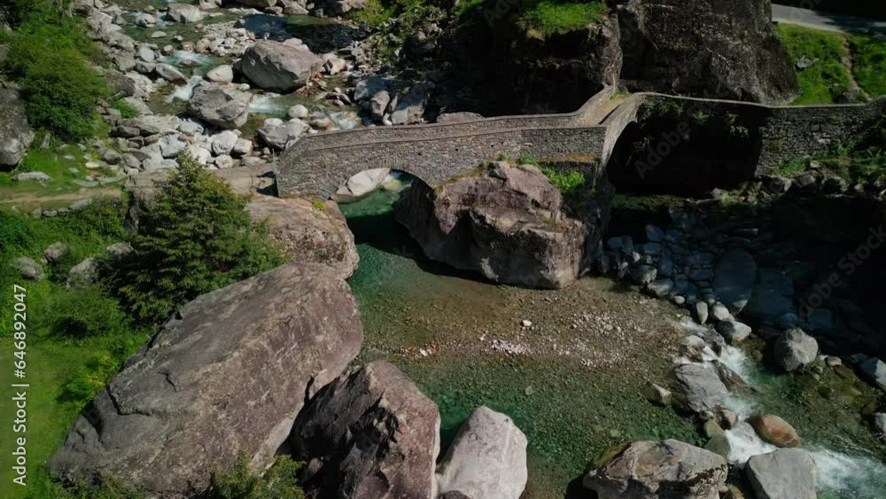 tone pedestrian bridge over an alpine stream from the mountains tone pedestrian bridge over an alpine stream from the mountains