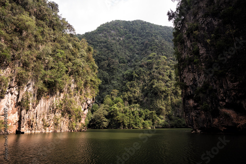 Tasik Cermin or Mirror Lake, Ipoh, Malaysia - Tasik Cermin, or Mirror Lake, is a stunning hidden lake surrounded by limestone karst towers. Located near Ipoh town, Perak state, Malaysia.