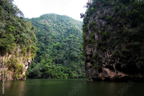 Tasik Cermin or Mirror Lake, Ipoh, Malaysia. Tasik Cermin, or Mirror Lake, is a stunning hidden lake surrounded by limestone karst towers. Located near Ipoh town, Perak state, Malaysia.
