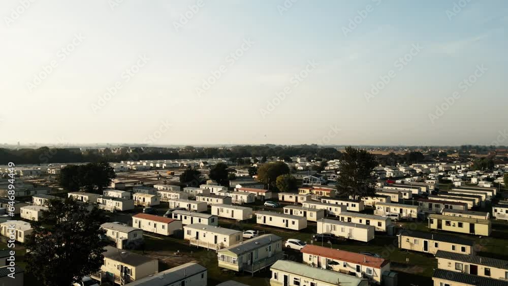 Skegness, Lincolnshire, with this captivating aerial video, highlighting the coastal holiday parks, caravans, holiday homes, and summer evening ambiance. Skegness, Lincolnshire, with this captivating aerial video, highlighting the coastal holiday parks, caravans, holiday homes, and summer evening ambiance.