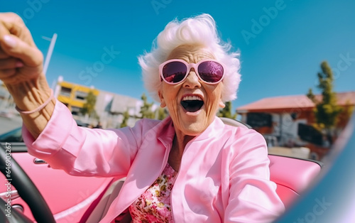 A hilarious older woman has fun driving her convertible car