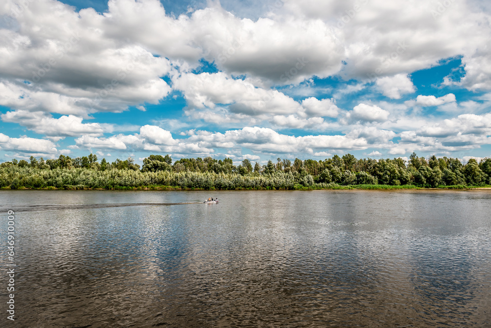 Beautiful landscape with river and cloudy sky Beautiful landscape with river and cloudy sky