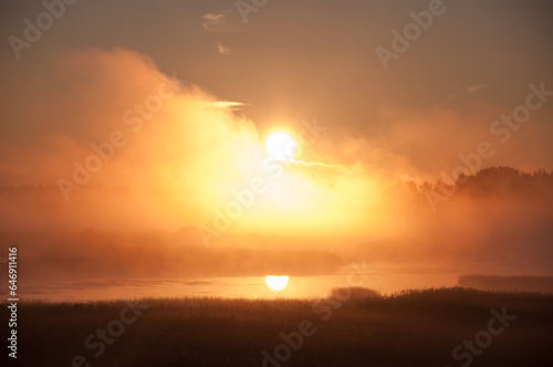 Sunrise and early morning fog in the Kokem  enjoki river delta in Pori  Finland