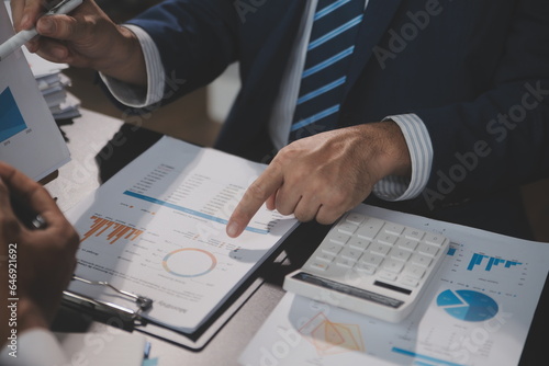 Team of business people working together in the meeting room office, teamwork background charts and graphs banner, double exposure successful teamwork,business planning concept.