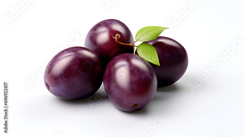 four plums isolated on white