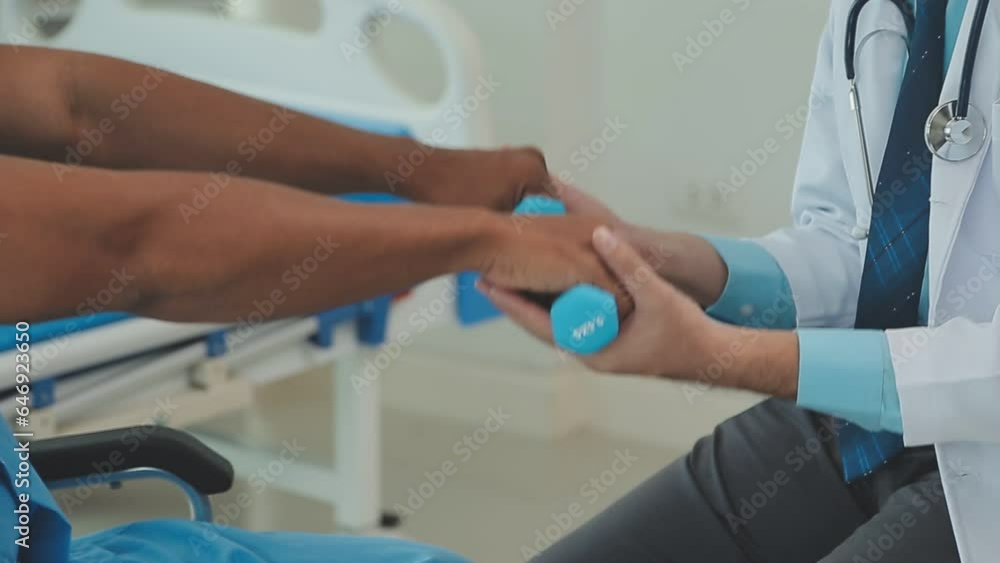 Therapist treating a male injured by rotator cuff stretching method, Physical therapy concept. Therapist treating a male injured by rotator cuff stretching method, Physical therapy concept.