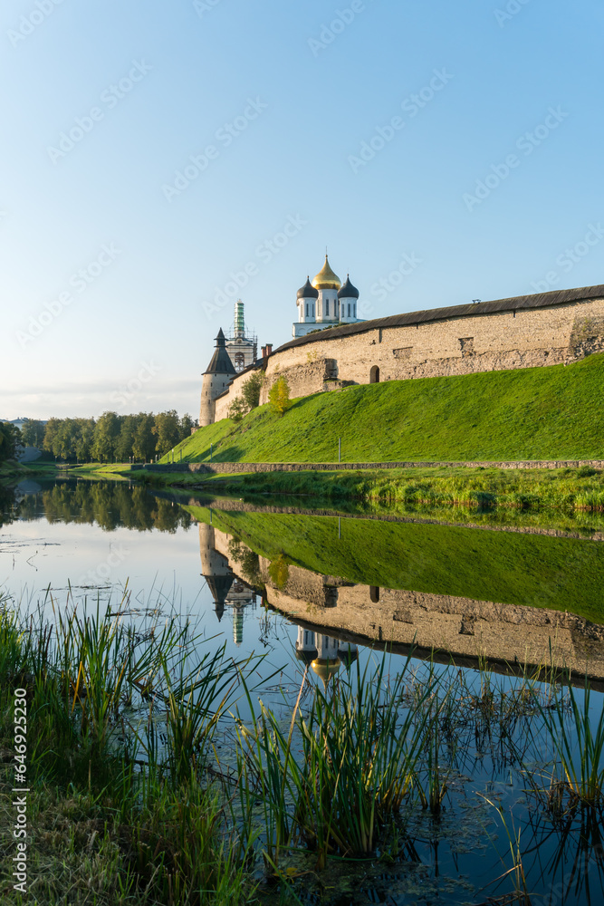 Pskov, Russia, September 11, 2023. The Velikaya River and the walls of the ancient Kremlin.