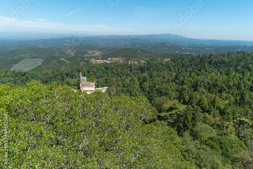 View at the Palace of Bucaco with garden in Portugal. Palace was built in Neo Manueline style between 1888 and 1907. photo