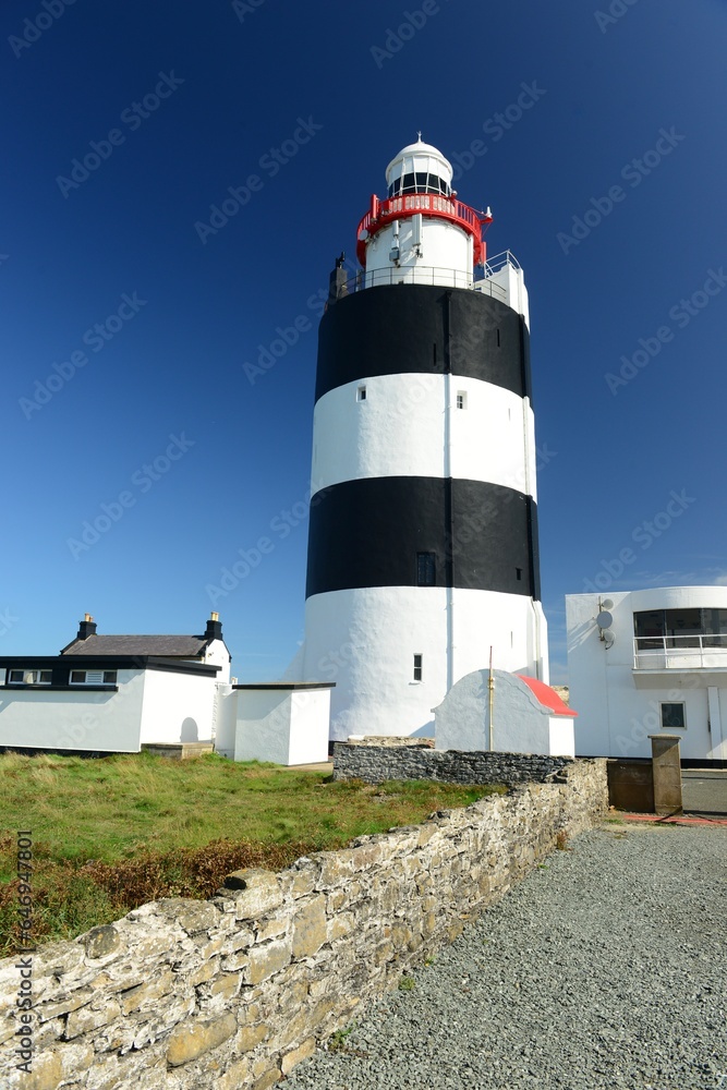 The Hook lighthouse, County Wexford, Ireland. One of the oldest beacons in the world 1157, on an unusually hot beautiful Autumn day.