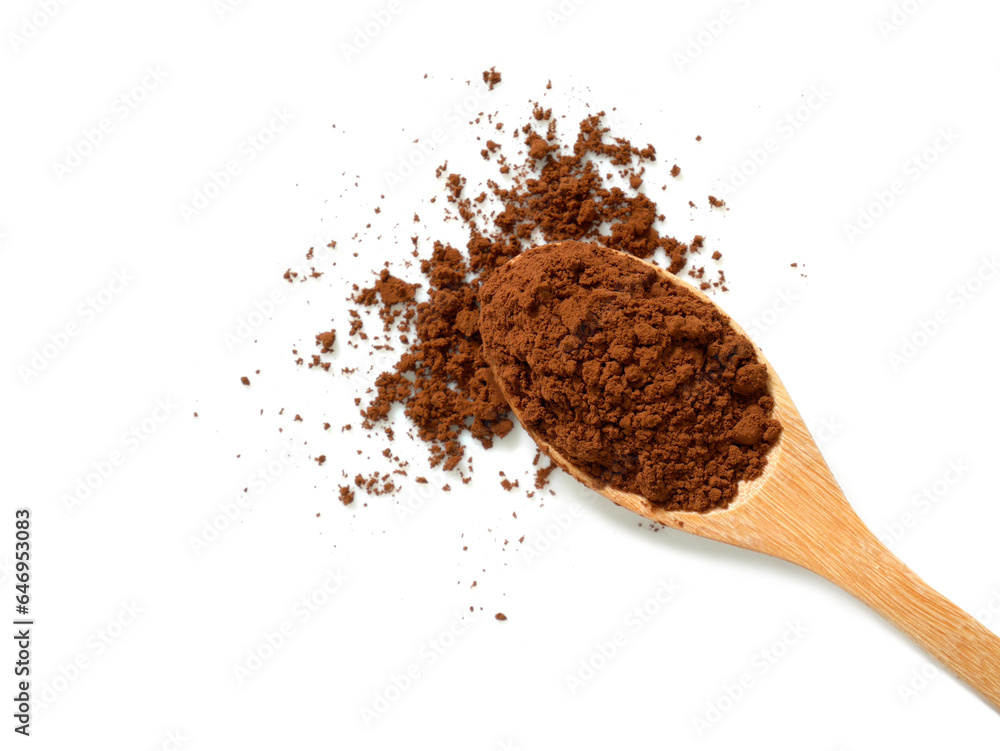 Pile of cocoa powder in wooden spoon Pile of cocoa powder in wooden spoon
