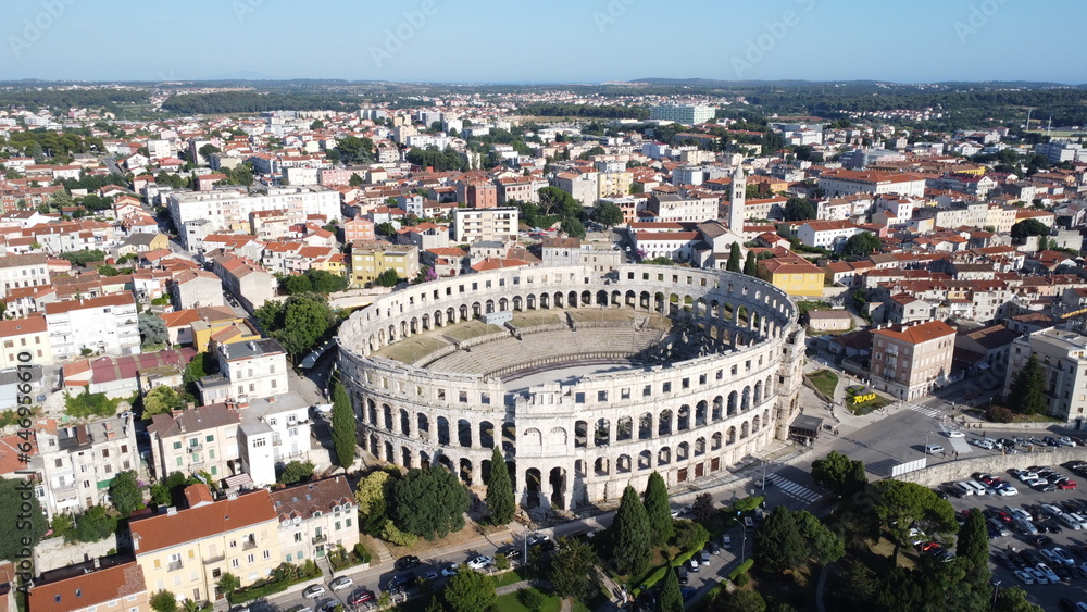 An aerial view of the Pula Arena located in Pula, Croatia. It is the only remaining Roman amphitheater to have four side towers entirely preserved.
