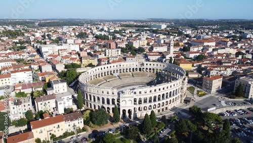 An aerial view of the Pula Arena located in Pula, Croatia. It is the only remaining Roman amphitheater to have four side towers entirely preserved.