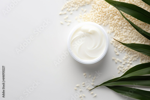 Cosmetic skin care product body lotion  face cream or mask on background of rice or oatmeal
