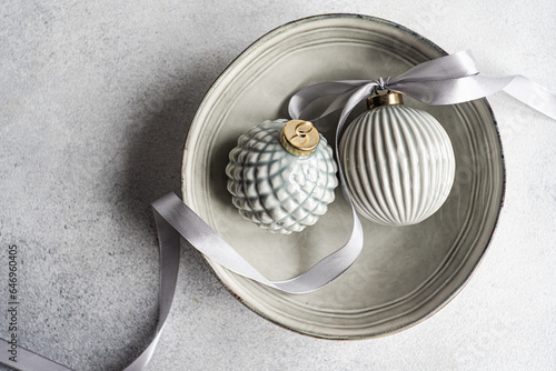 Christmas baubles on bowl grey