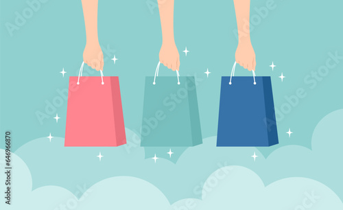 Hands holding glowing shopping bags of different colors on a green background. Vector illustration in flat style