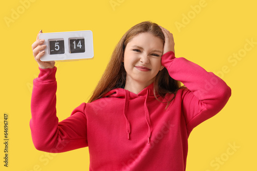 Stressed young woman with c...