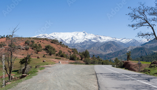 View of the snow-capped peaks of the High Atlas, from the N9 east of Toufliht in Morocco.