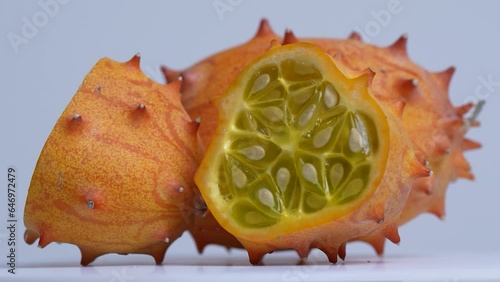 Kiwiano fruit spinning around on a table