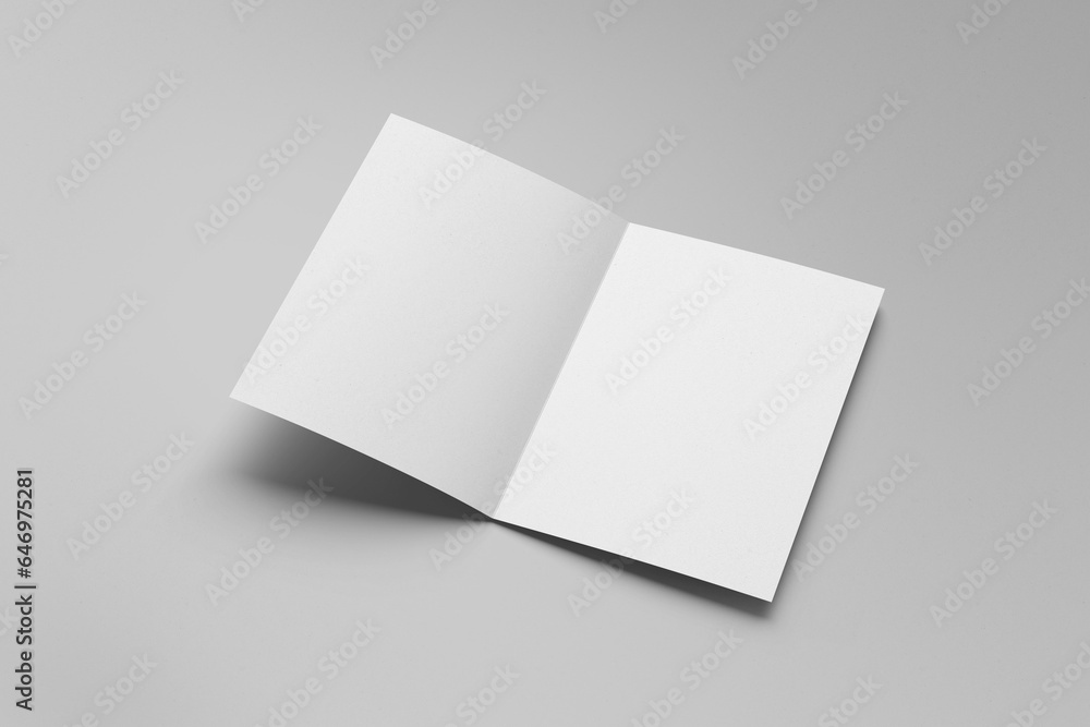 Booklet or brochure a4 bifolded mockup isolated on gray background. Booklet or brochure a4 bifolded mockup isolated on gray background.