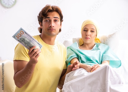 Husband looking after wife in hospital